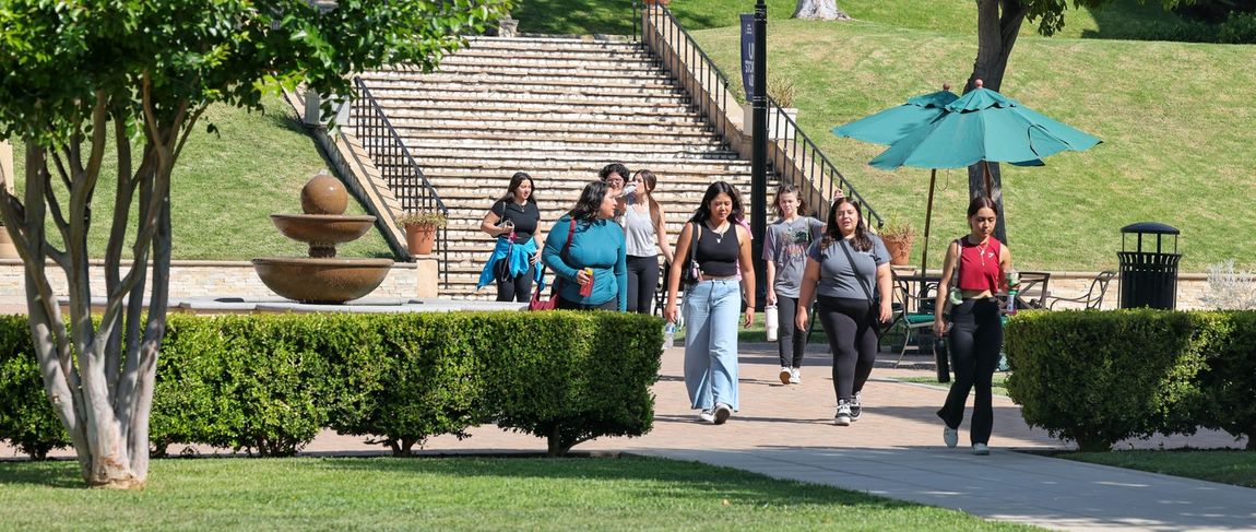 group of students walking on campus