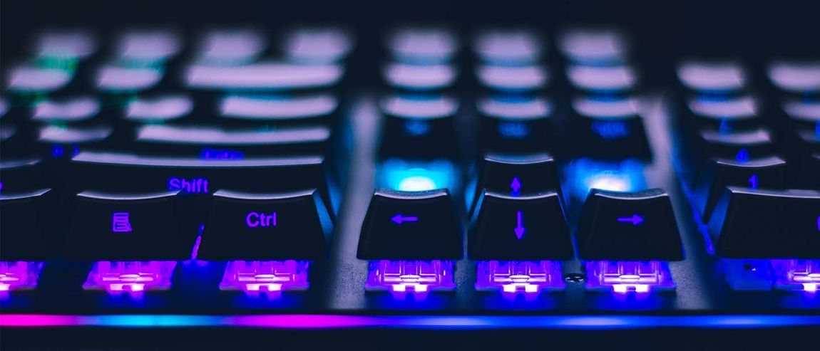 computer keyboard close-up with LED lights