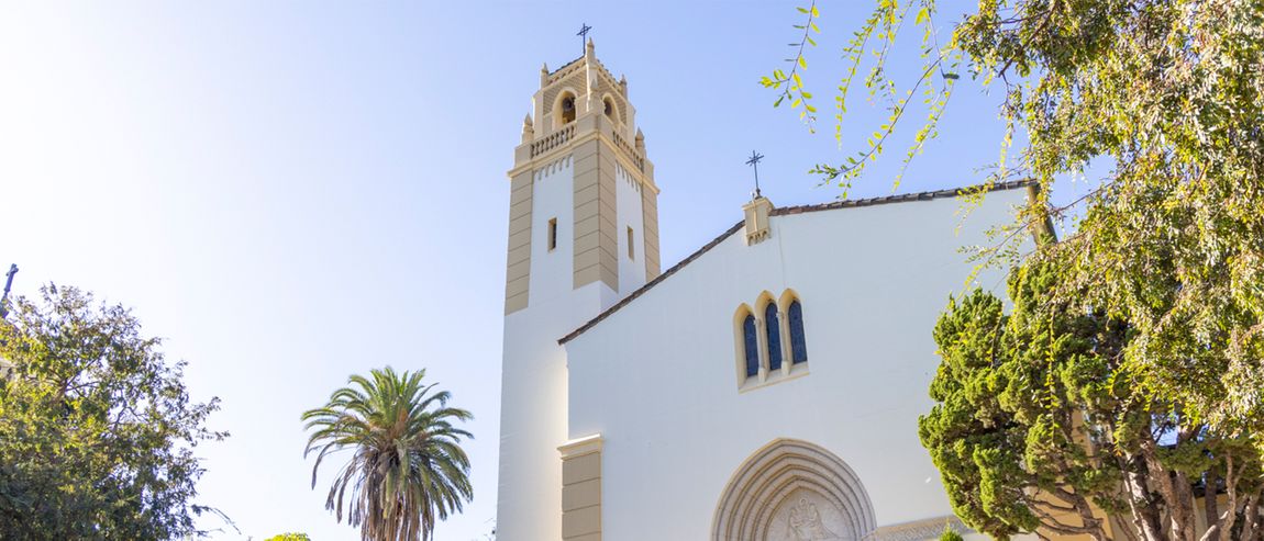 An image taken looking up at a chapel and tower behind it on 91ɬ��s Chalon campus