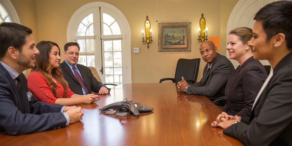 A group of the Mount’s MBA students attend a conference meeting.