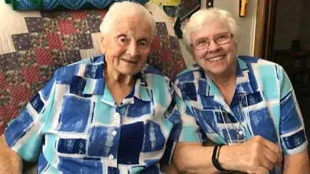 Twinning? Sister Barbara Anne '60 (right) and Sister Catherine Irene are all smiles in their matching blouses.