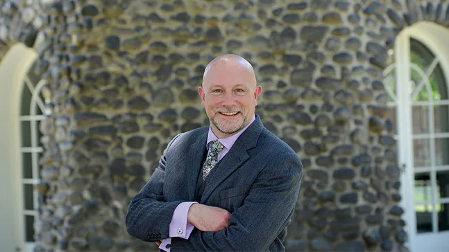 Robert (Bob) Perrins, PhD, provost and vice president for academic affairs, has tackled many topics as a historian. Up next: chronicling the Mount's first 100 years.