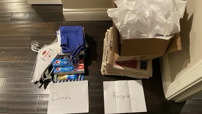 Within minutes of the start of the spring cleaning session, individual had two piles going -- one for donations and one for recycling.