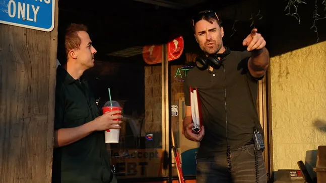 Actor Frankie Muniz (right) and director Brian Hanson '16 (left) on the set of Hanson's film 