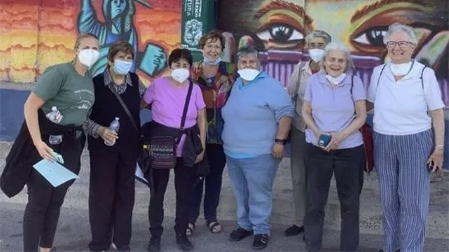 A group of sisters at the Posada del Migrante Shelter just across the US/Mexico border. Sister Suzanne Jabro, CSJ, '69, is fourth from the left and Sister Sally Koch, CSJ, director of communications for CSJLA, is on the far left. Sister Jabro founded the nonprofit Border Compassion to invite faith communities to cross over and assist the 300 migrants living at the shelter.