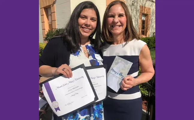 Celebrating her first Mary's Day awards in 2019 with President Ann McElaney-Johnson, Alicia Mercado '22 is this year's Unstoppable Scholar.