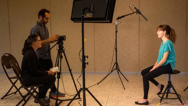 Mary Trunk, assistant professor of film, prepares to shoot Kaitlin Webster-Zuber’s ’22 in the mobile storytelling booth. “I’m here to learn how to be a better leader and how to bring my voice and my music to help lead,” she said. Her two main takeaways: the importance of having more confidence in everything you do and to not be afraid to collaborate with others and make new connections.