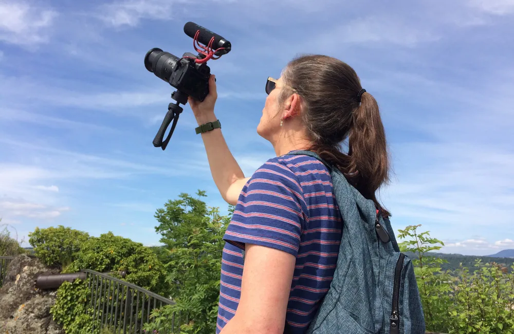 Mary Trunk records b-roll during a University pilgrimage to Le Puy, France, this summer. A documentary filmmaker and Mount instructor, Trunk is the co-producer of the CSJ Oral History Project.