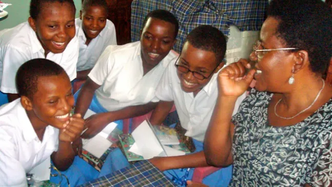Aichi Kitalyi, PhD, who spearheaded the Carole Cole scholarship program, seen here in 2010 with the first group of scholars.