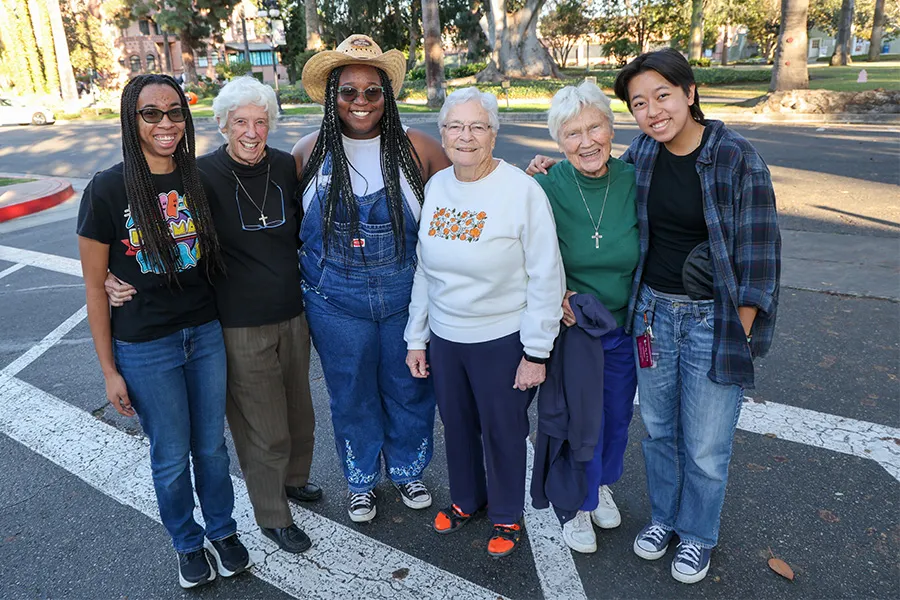 Students and CSJ Sisters enjoying the Halloween celebrations.