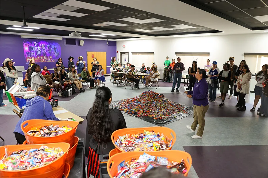 Volunteers met to coordinate their roles at the event before guests arrived.