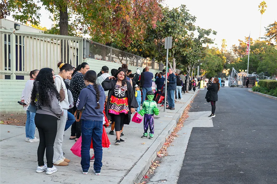 Guests lining up in front of the Doheny Campus entrance to join the Halloween celebrations.