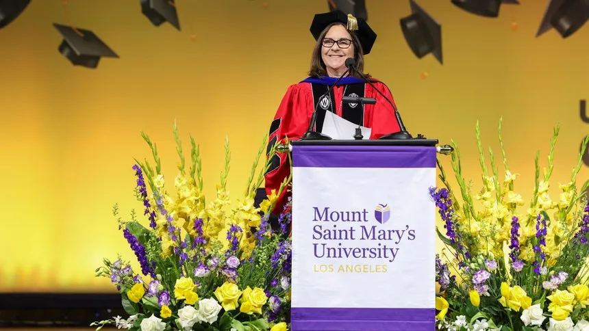 ˮ���� President Ann McElaney-Johnson delivers a warm address to graduates during Commencement 2025, held at the Shrine Auditorium in Los Angeles.