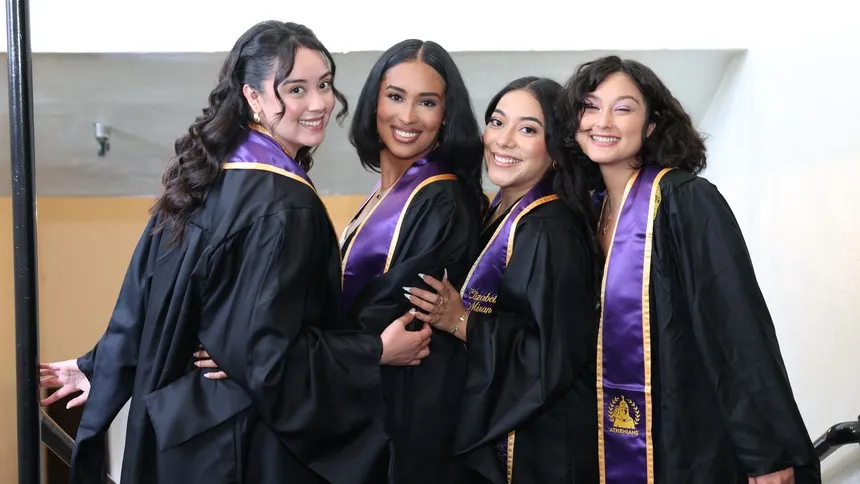 Students celebrate during the graduate Commencement ceremony at the Shrine Auditorium.