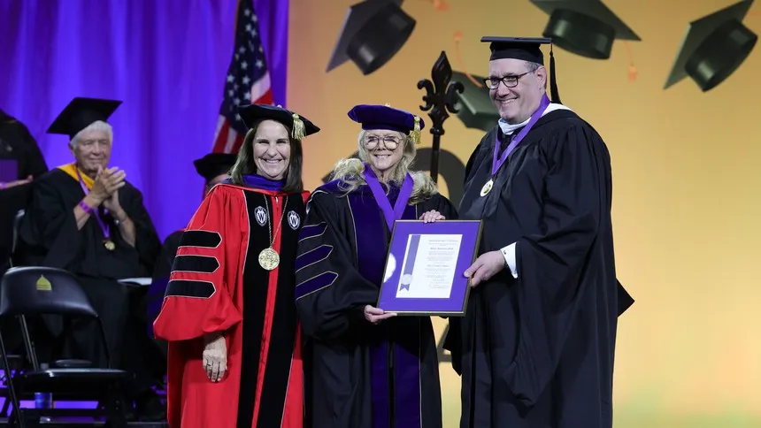 President Ann McElaney-Johnson presents the Carondelet Medal to Helen Boutrous, PhD, JD, and honors Thomas J. Blumenthal with an honorary Doctor of Humane Letters degree at Commencement 2026.