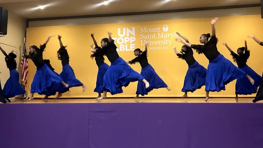 The dance group Anointed Feet Dance, directed by Dr. Kanisha Bennett, performing at the event.