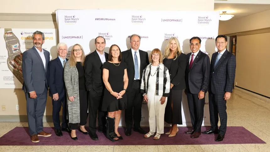 Robyn Jones, executive director of the Marymount Education Foundation (third from right) with leaders from partner universities.