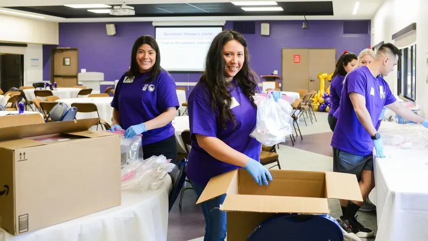 Students assemble care kits, preparing essential items for community partners supporting individuals in need across Los Angeles