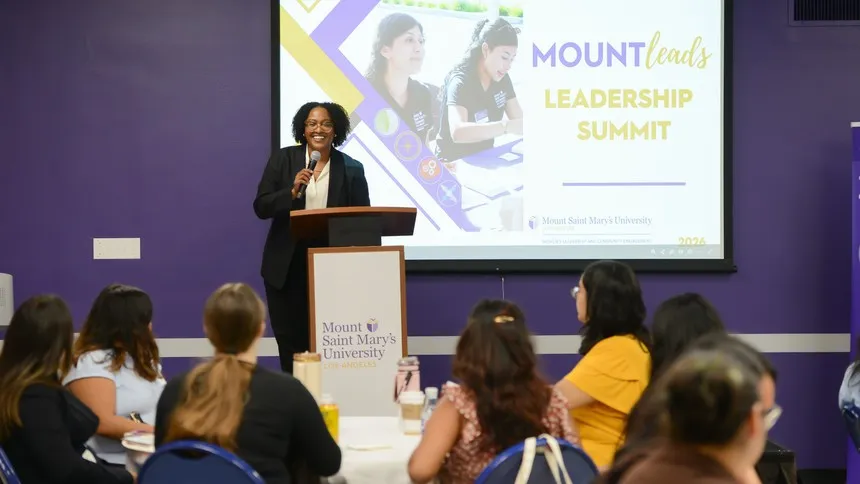 Lisha K. Maddox, EdD, executive director of Student Life, Women’s Leadership, and Community Engagement, speaks during the event.