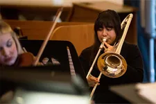 Student playing a trumpet