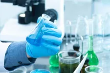 A student holding a beaker