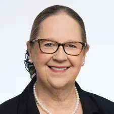 Woman smiling with glasses
