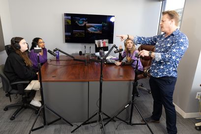 podcast recording with faculty