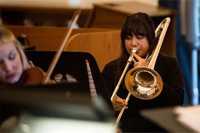 Student playing a trumpet