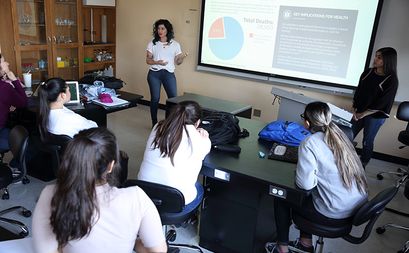 student presenting research findings