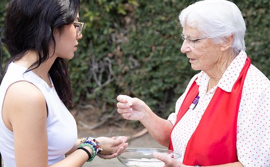 A student receiving communion.