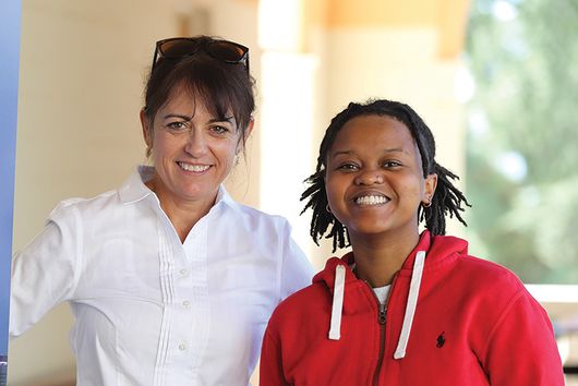 Two women smiling