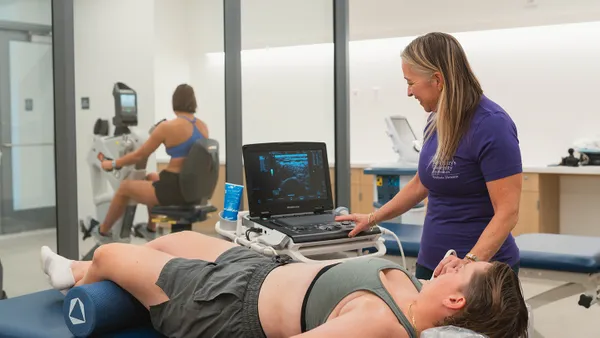 An instructor teaching physical therapy