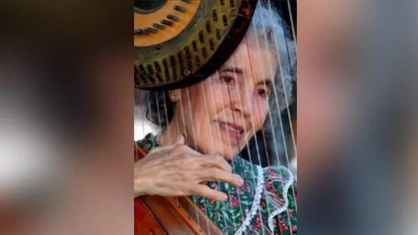 Ruth Freedman playing the harp