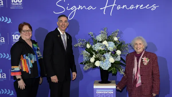Sister Callista Roy, CSJ, '63 received a lifetime achievement award from the Sigma Theta Tau International honor society of nursing at its biennial convention earlier this month. With her are Sigma Foundation's Elizabeth Madigan, PhD, Rn, FAAN, chief executive officer, and Richard Ricciardi, PhD, CRNP, FAANP, FAAN, president. Photo courtesy of King Shot Photography.
