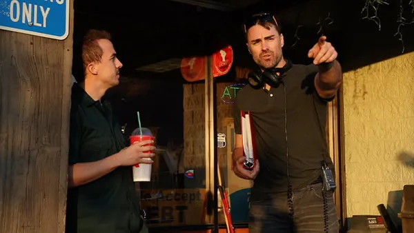 Actor Frankie Muniz (right) and director Brian Hanson '16 (left) on the set of Hanson's film 