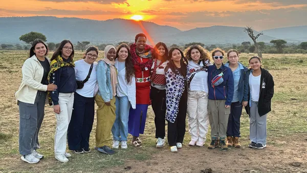 Mount students Miah Vega, Deysi Sandoval, Bailee Gil, Rabia Yasin, Sophia Serna, Sanjukta Jayaprakash, Stephanie Ahorro, Janelle Zavaleta, Emily Wong, Madison Wong and Nichole Bondocoy with a guide from the Wildlife Tourist College of Maasai Mara (sixth from left) in Kenya.