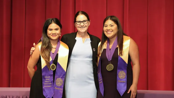 President Ann McElaney-Johnson with President's Award recipients Nichole Bondoco (left) and Karely Molina Martinez.
