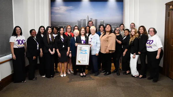 Mount Saint Mary’s University leaders, students, staff and Sisters of St. Joseph of Carondelet stand with Councilmembers Eunisses Hernandez (front row, sixth from right), Traci Park (back row, seventh from left) and Monica Rodriguez (front row, fifth from right) following the presentation of a Los Angeles City Council resolution honoring the University’s 100th anniversary and a century of excellen