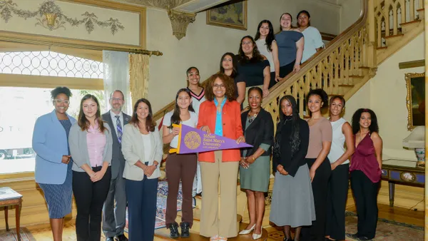 Congressmember Sydney Kamlager-Dove poses with Mount students and University administrators following a roundtable discussion at the Doheny Campus on Aug. 27.