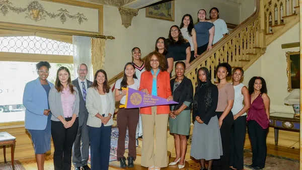 Congressmember Sydney Kamlager-Dove poses with Mount students and University administrators following a roundtable discussion at the Doheny Campus on Aug. 27
