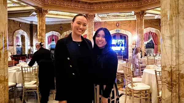 Marielle Shrock '17 (left) and Analiese Yu '15 at the d at the Etiquette and Networking Dinner hosted at the Doheny Mansion last March.