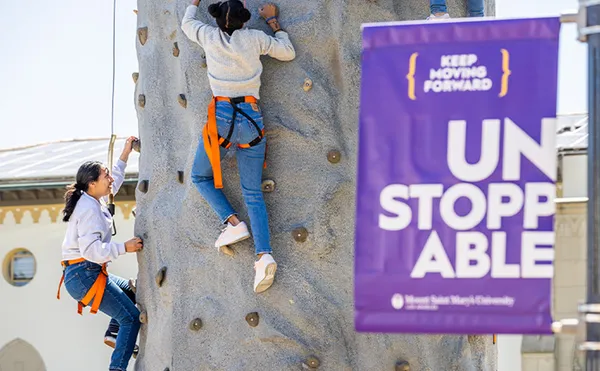 Students rock climbing.