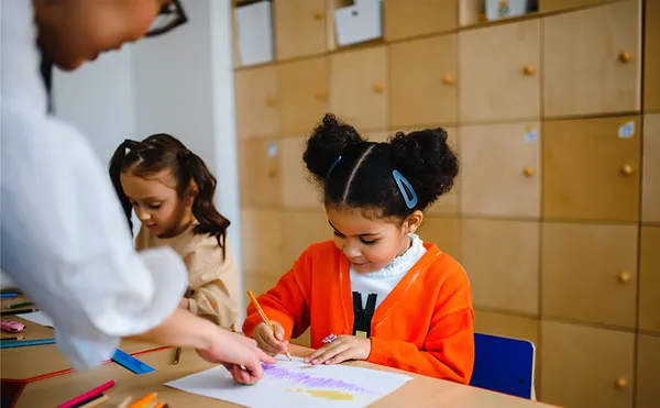 Teacher teaching student