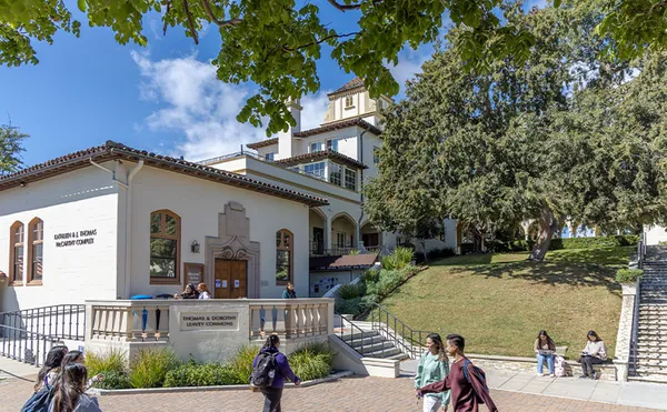 Students walking outside lounge