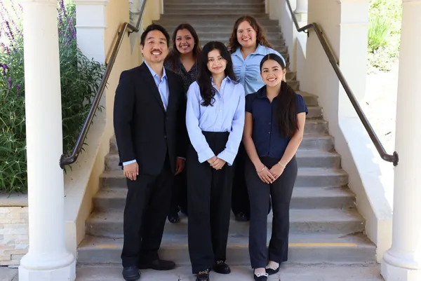 A student using a microscope