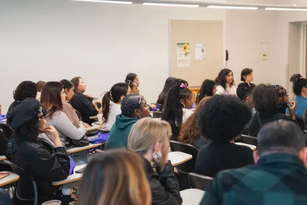 Students sitting in a classroom.