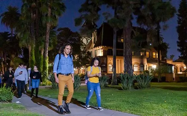 students walking at night