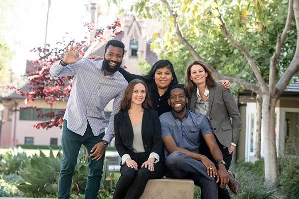 Five people in business attire