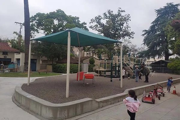outside shot of kids playing on a playground