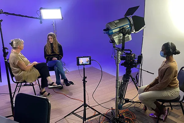 Students on stage in class